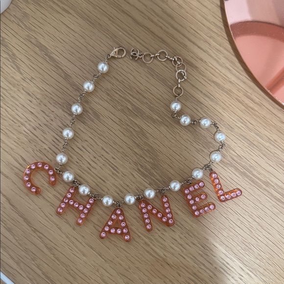 CHANEL Pink and Pearl Letter Necklace - Picture 1 of 6